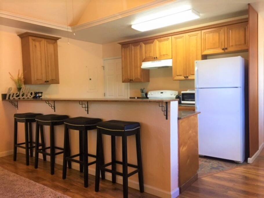 Kitchen is equipped with all the tools you need. Stools for dining.
