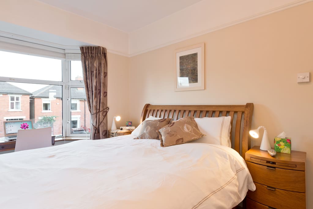 KING SIZED BED -view of tree lined street