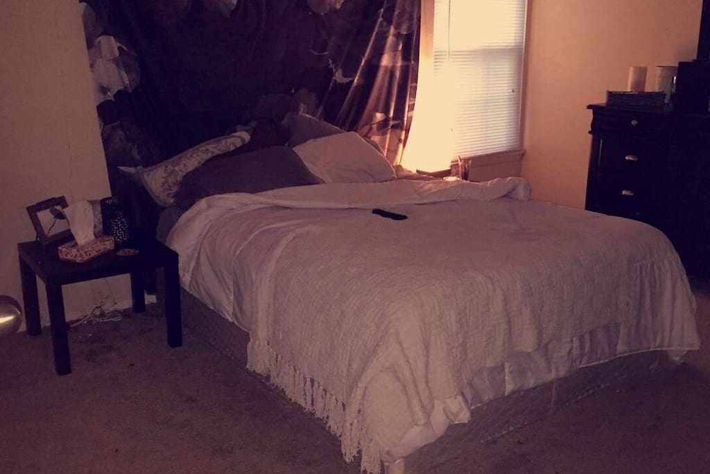 Cloud of a queen bed to sleep on ! (This bed room has a bathroom attached to it)