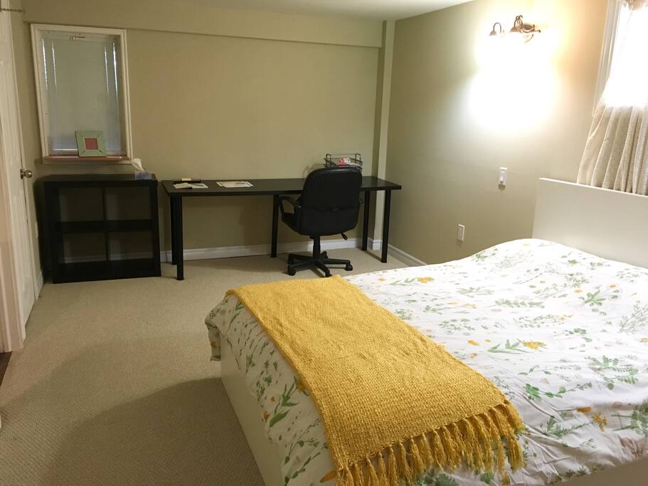 Bright spacious bedroom with double bed