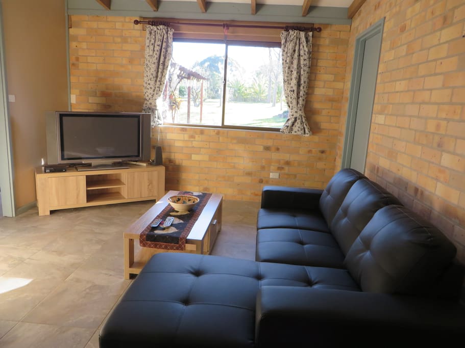 large flat screen tv in lounge