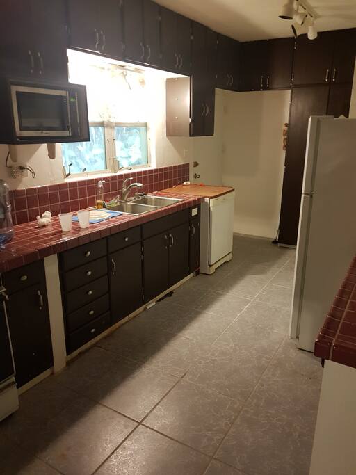 Full size kitchen fridge stove microwave