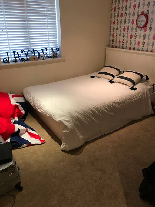 Spare bedroom with double bed.