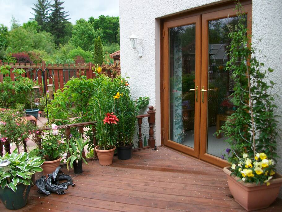 Deck onto garden guarded by resident Dragon