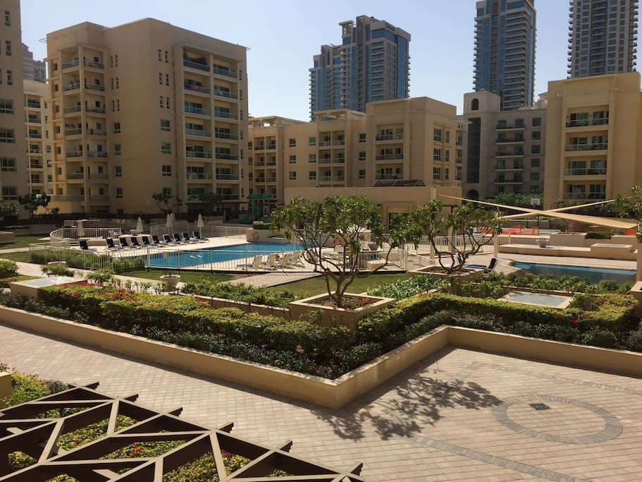 Beautifully landscaped pool area. Gym located next to the pool