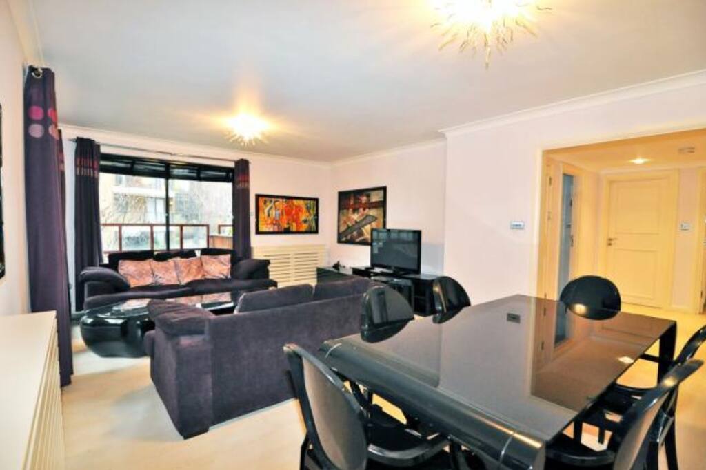 Living room/dining room with balcony