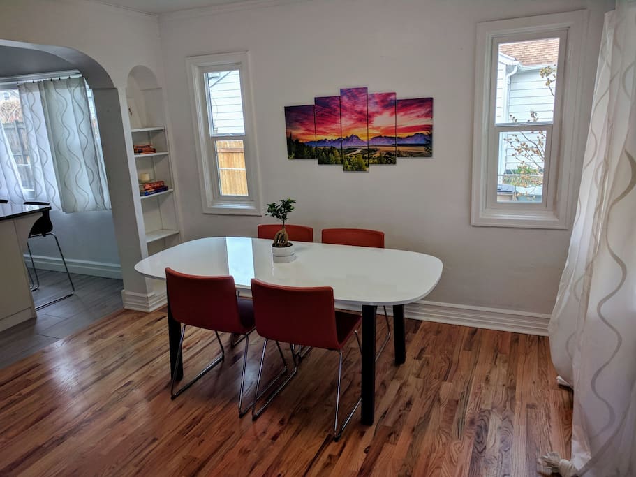 Dining room open to the kitchen and living. Open and social.