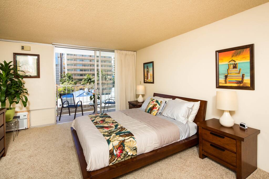 Amazing queen size bed with direct balcony access!