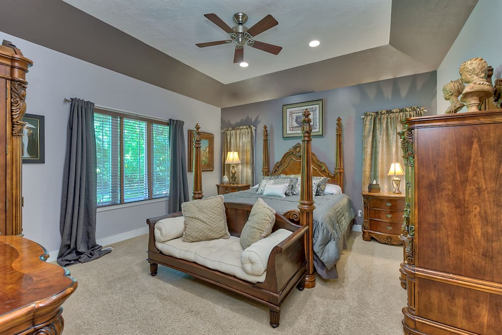 Beautifully decorated main floor master with a very comfortable king size bed, 40" LED HDTV, and ample storage