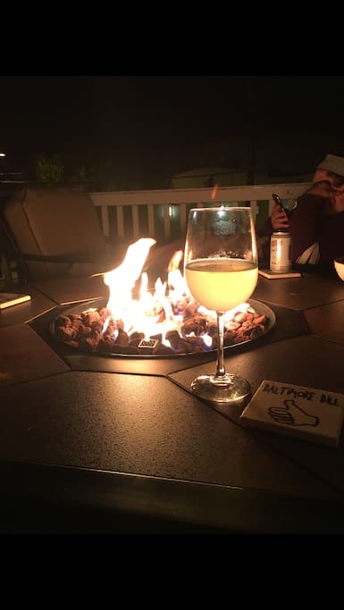 wine by the fire pit on deck