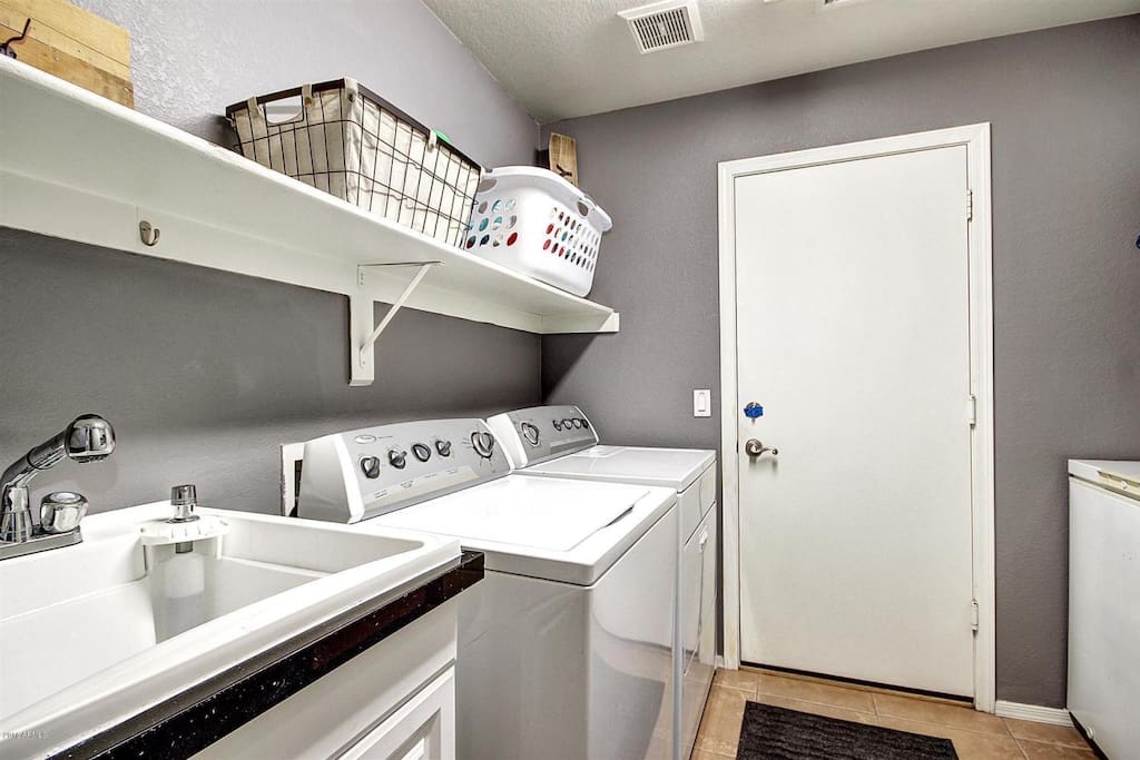Washer/ Dryer and Sink in the Laundry Room