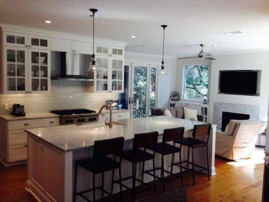 Newly renovated gourmet kitchen and great room seats 12 comfortably: 4 at breakfast table, 4 at bar and another 4 in the living room.