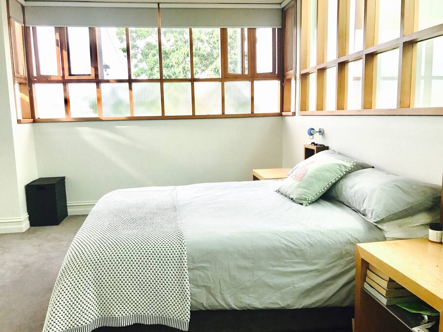 Upstairs master bedroom with en-suite - amazing natural light and city views.