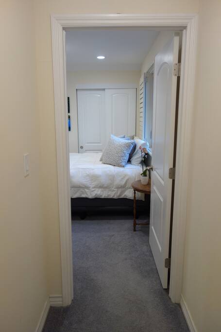 This comfy, bright room offers privacy with all the house amenities just downstairs.