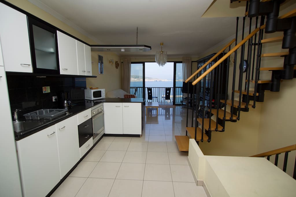 Aqua Kitchen, Lounge and Lower Balcony overlooking St. Paul's Islands & Beyond