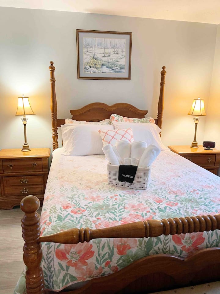 Queen room has a new memory foam topper. Mattress, boxspring and pillows all have encasements that are water, dust and bug proof. Super soft microfiber bedding and cotton quilt. The window has knockout light curtains and a view of the river.  24” TV