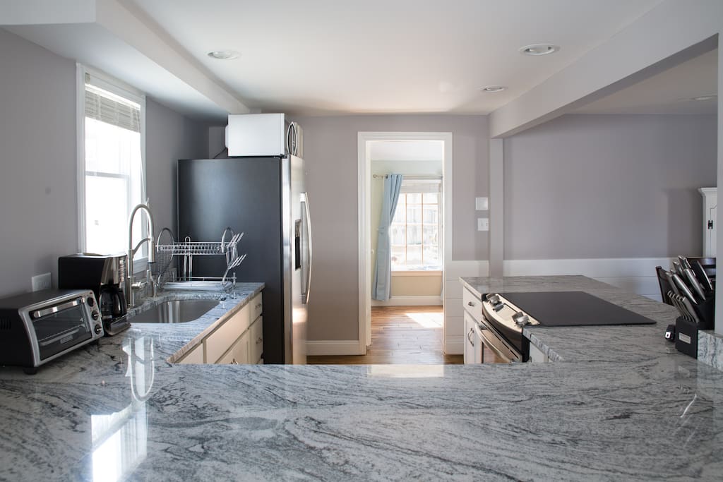 Italian Granite Kitchen with Stainless Steel Appliances