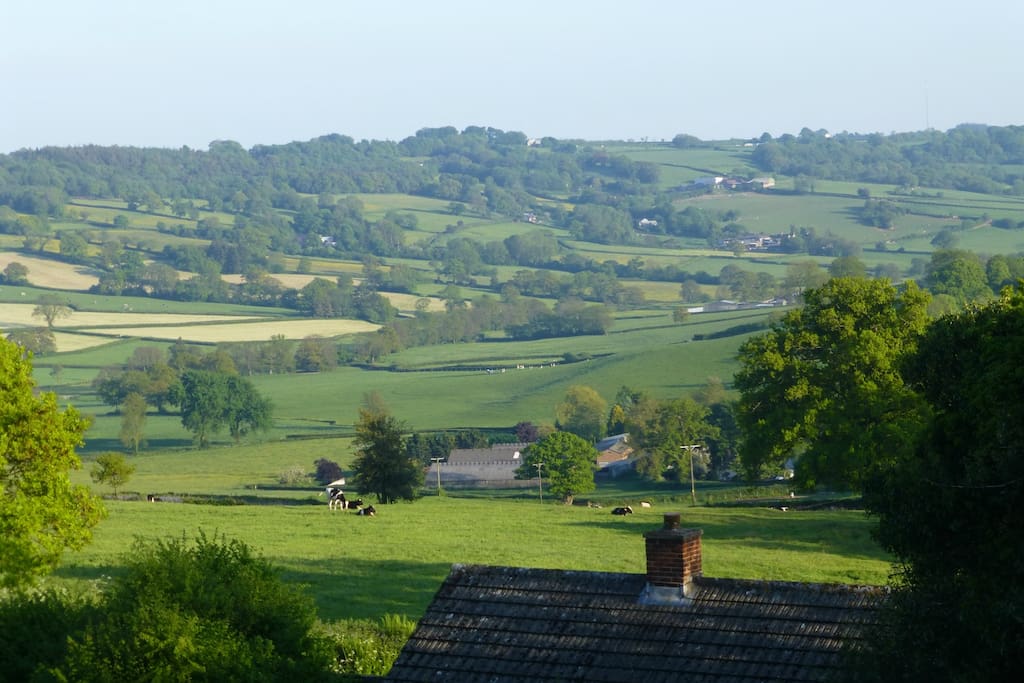 The view from Otter Rise, the cottage roof is in foreground