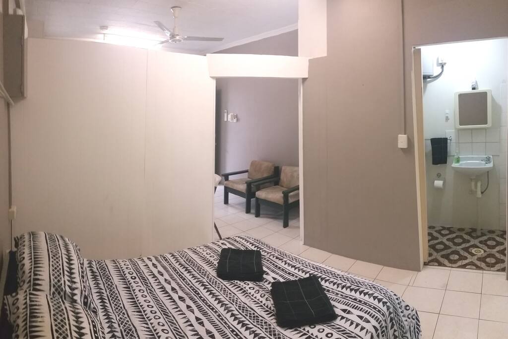There is a partial wall between the bed and living area to offer extra privacy.