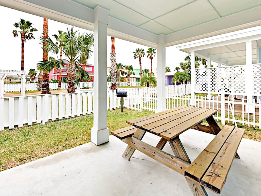 Enjoy meals al fresco on the covered back deck.