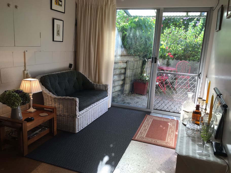 Relax on the couch in this comfortable bedroom