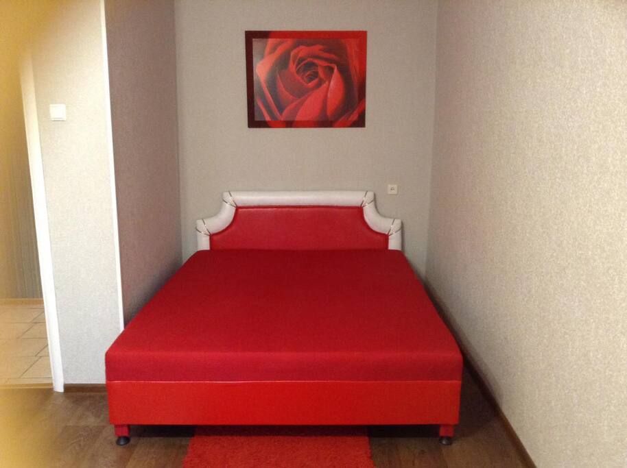 This is a cozy room, where there is a double bed and a folding modern sofa. Air conditioning, a balcony where you can smoke.