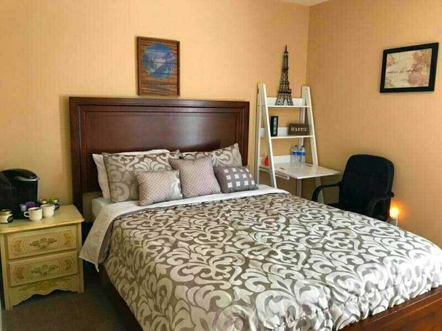 Room 1: Queen Size Bed, Desk, Night Stand with Keurig, TV, Dresser, Closet