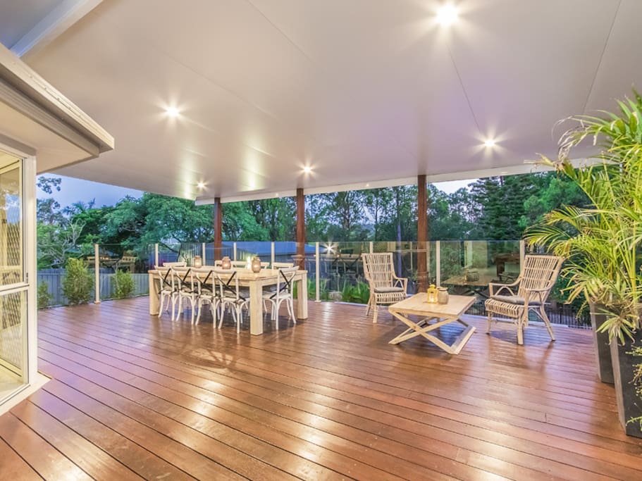 wide open entertaining deck with views to parkland. 10 seater table plus separate setting for eight.