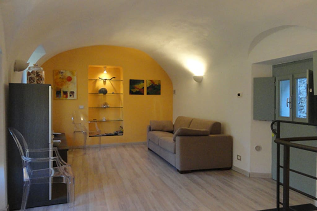 The livingroom is quite spacious, one of the largest in the village. A large sofa-bed to pull out is suitable for two additional guests. Thanks to that, it allows all the family to spend long-term stays at ease.