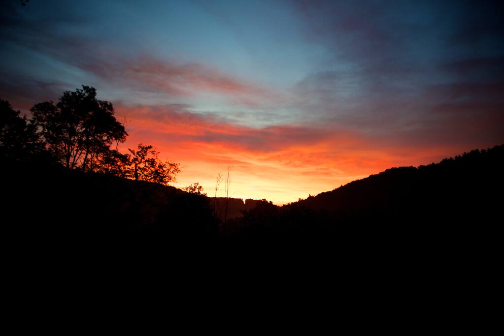 Sunrise over Blackberry Valley from the wraparound porch.