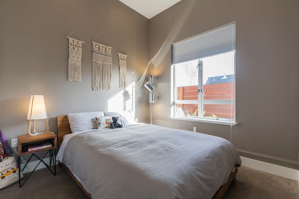 Bedroom is connected to the living room with macrame to warm the room