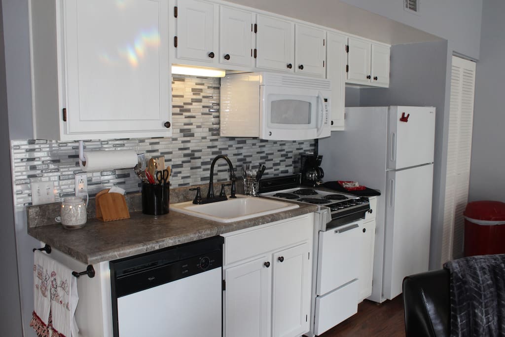 Full kitchen facilities come complete with utensils.