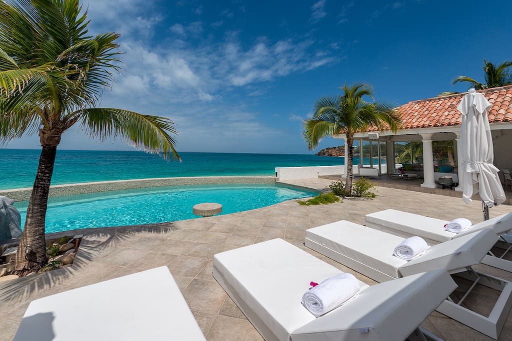 Lounge along the beach, swim in your private pool. Hear the swish of the palms?