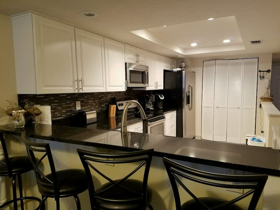 Kitchen with new cabinets and quartz countertops