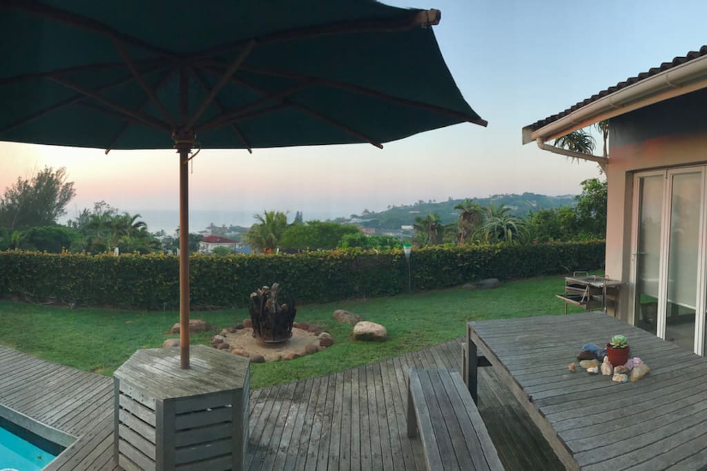 Deck, pool, outside dining, fire pit and braai/ barbecue area