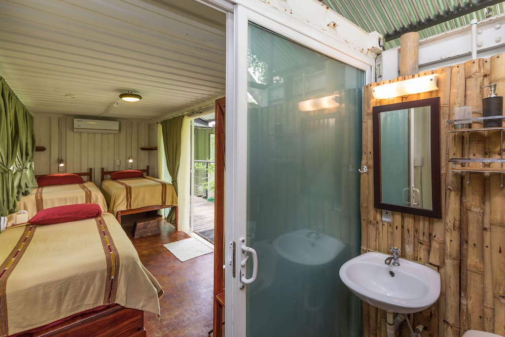 Our king rooms come with an ensuite bathroom, and the king bed can be split into three single beds.