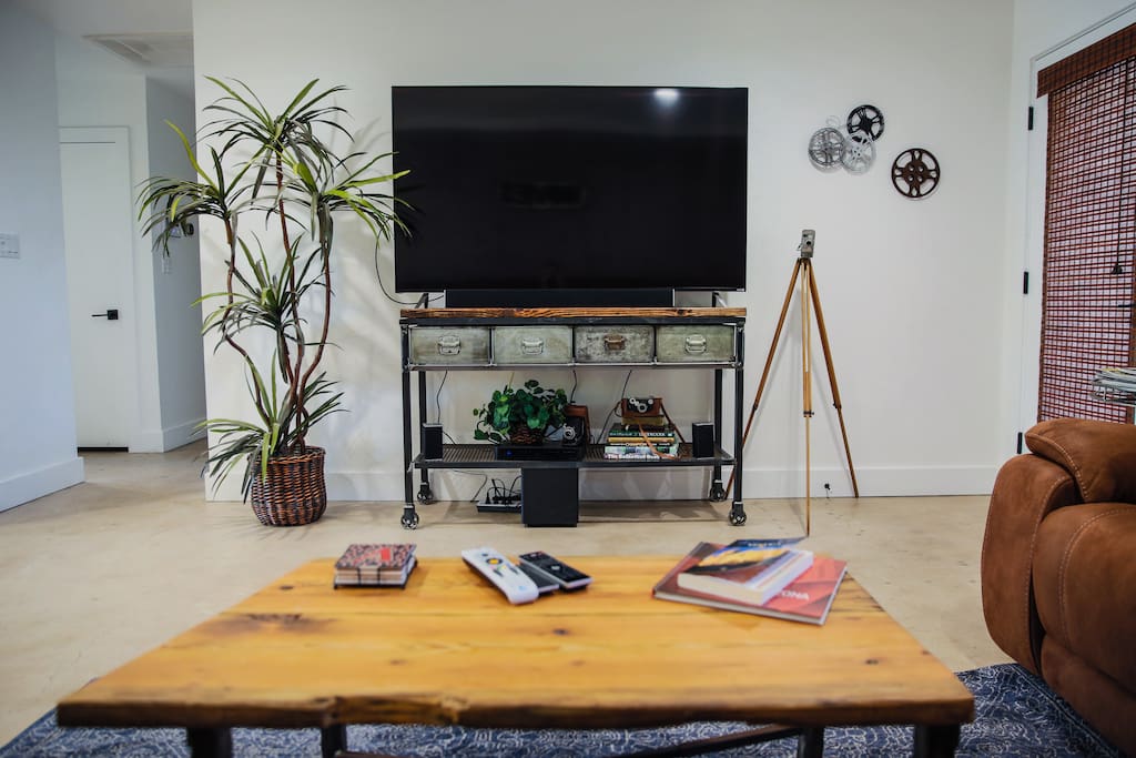 70" high def TV with Playstation with games and DVD's