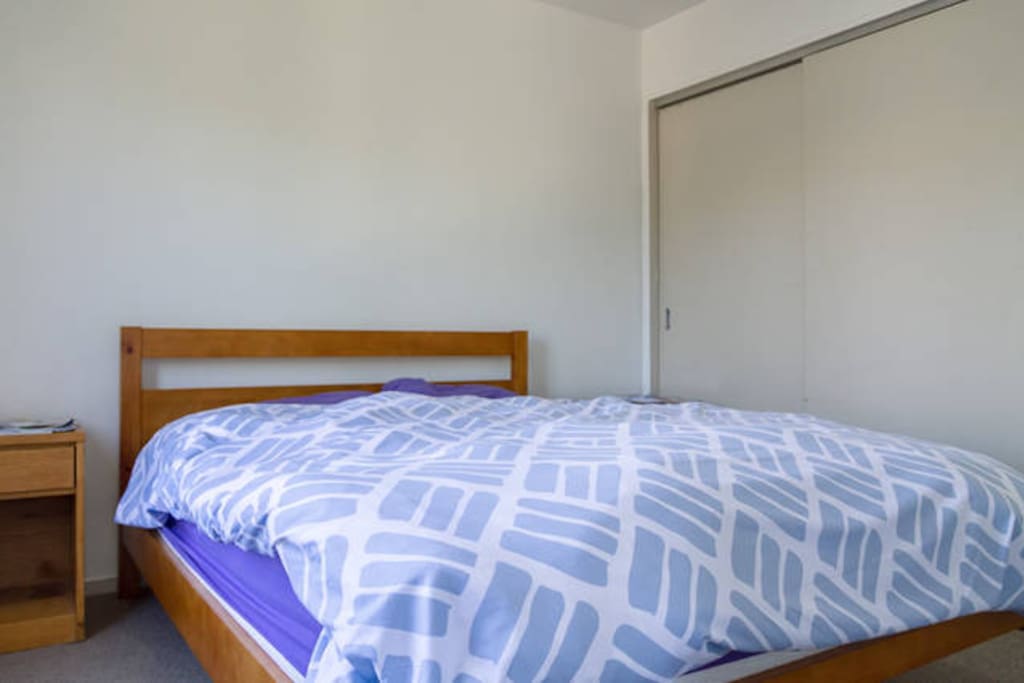Comfortable and clean queen sized bed that fits two adults. Crisp and clean bedsheets.