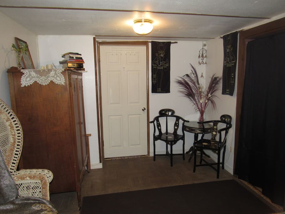 Bedroom. Handmade guest robes & slippers in armoire.
