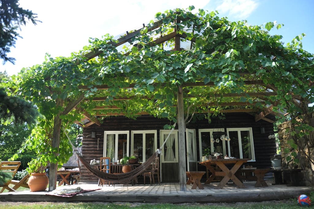 Attached to the main house is a large covered outdoor area, where we have all our meals during summertime