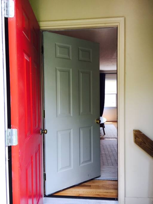 The front door to the studio opens up to the back yard garden.