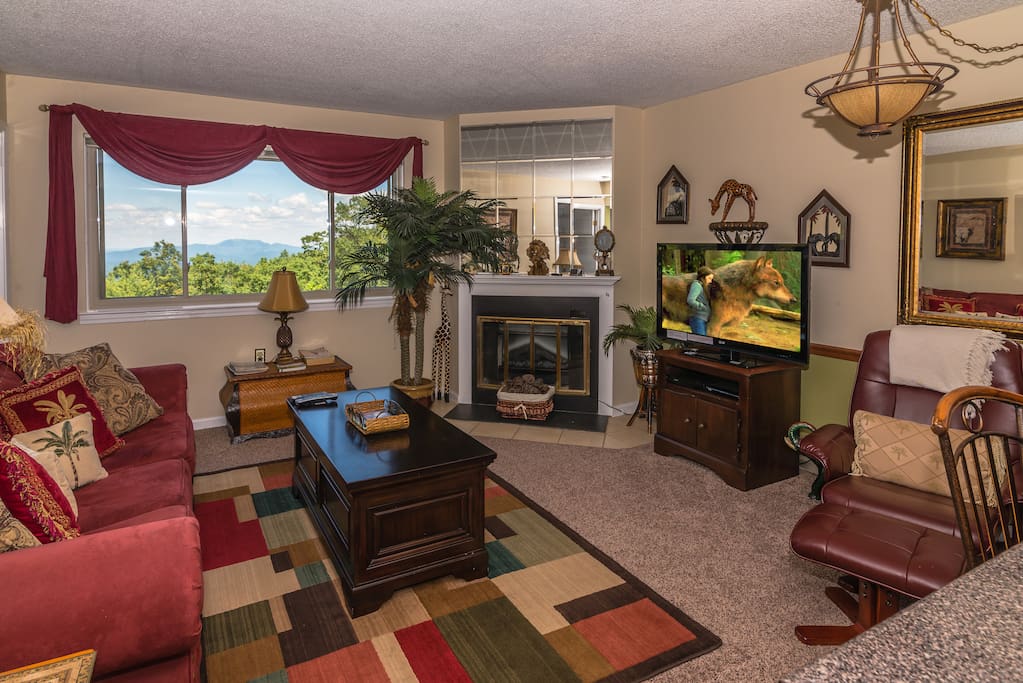 Cozy living room with fireplace, 44"TV