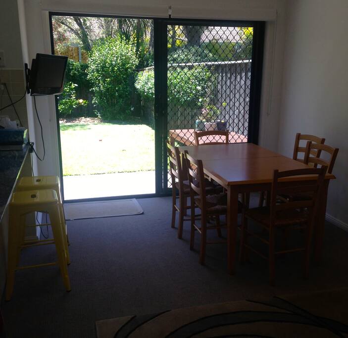 Outdoor dining in private back yard or watch the birds from the dining table.