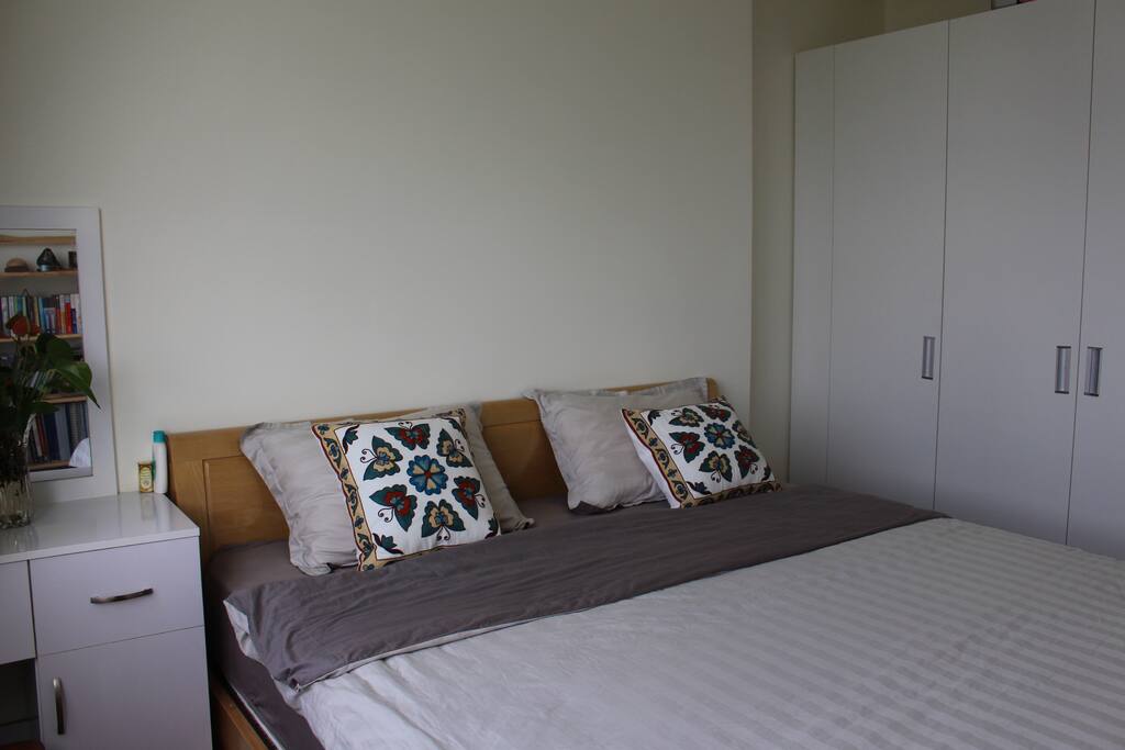 1 King bed with cover and pillows + 1 book shelf + 1 wardrobe