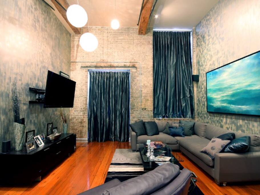 Comfortable living area with large mounted tv