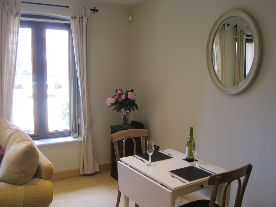 Dining area is at one end of the lounge