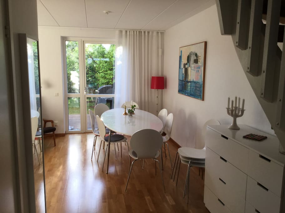 Part of the livingroom with a dinnertable for up to 12 people.