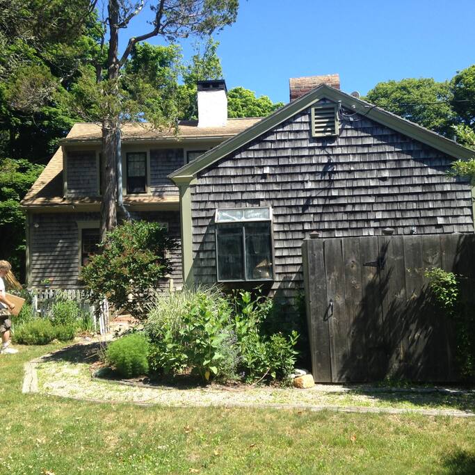 Back of house where new firepit and patio have been added.