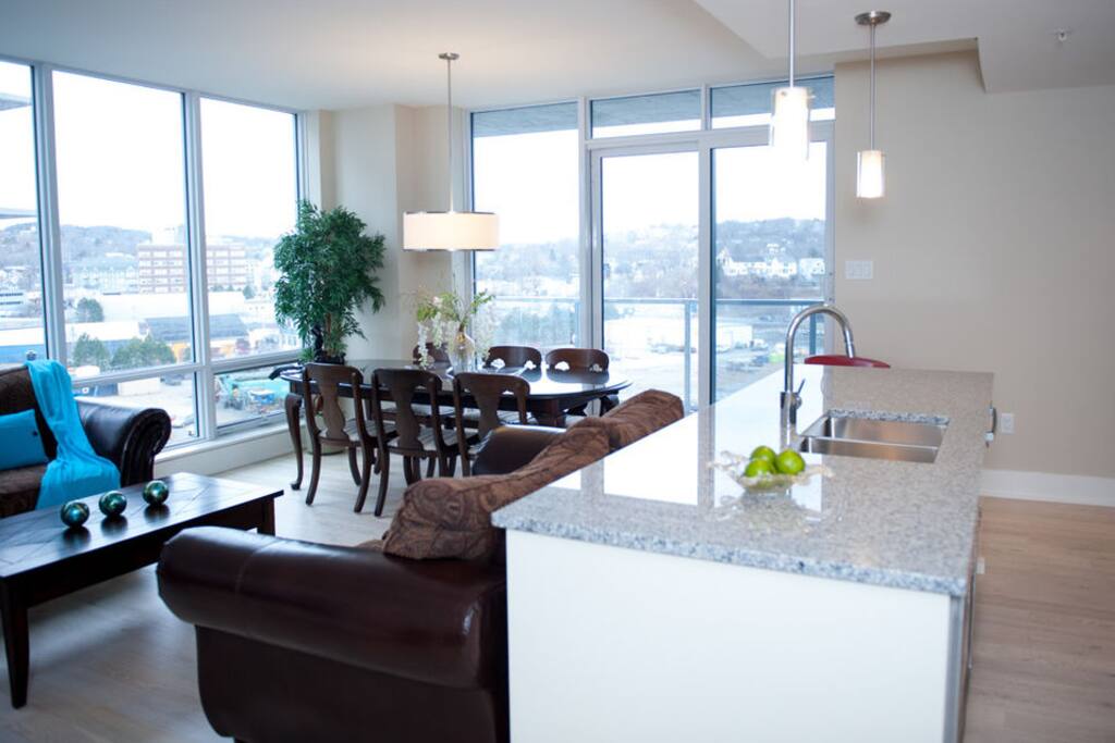 Living room with wall to ceiling windows