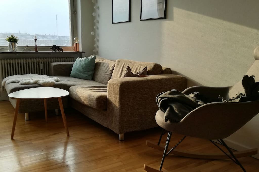 Nice and soft couch and a comfortable rocking chair